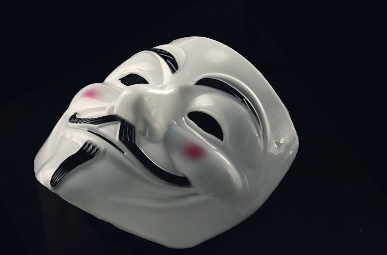 A mysterious Guy Fawkes mask symbolizing anonymity and incognito presence.